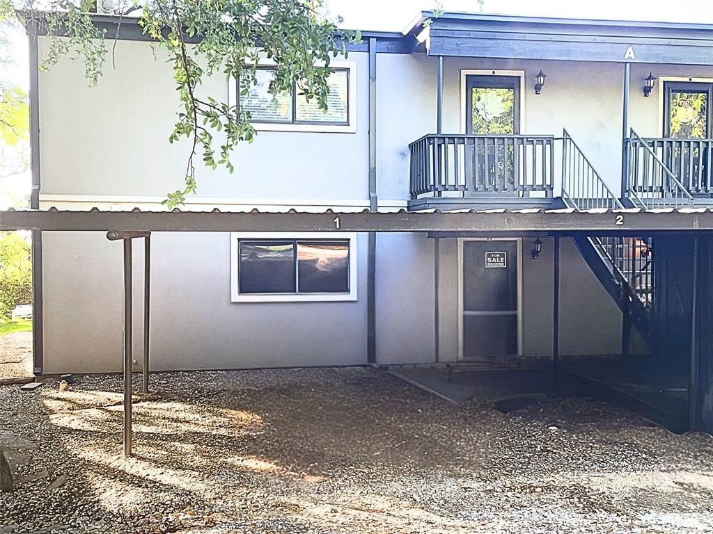 1655 Cedar Crest Loop, Unit A1 Graford, TX 76449 - Photo 13 of 15 a house view with a outdoor space