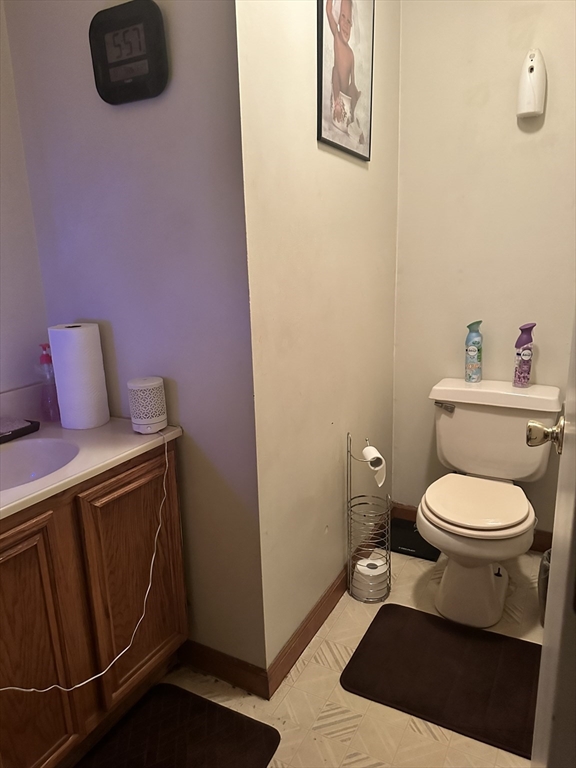 25-27 Merida Street Springfield, MA 01104 - Photo 9 of 20 a bathroom with a toilet and a sink