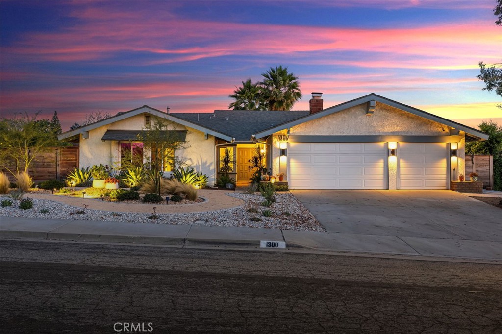 1300 Parkside Drive Riverside, CA 92506 - Photo 1 of 1 a front view of a house with a yard