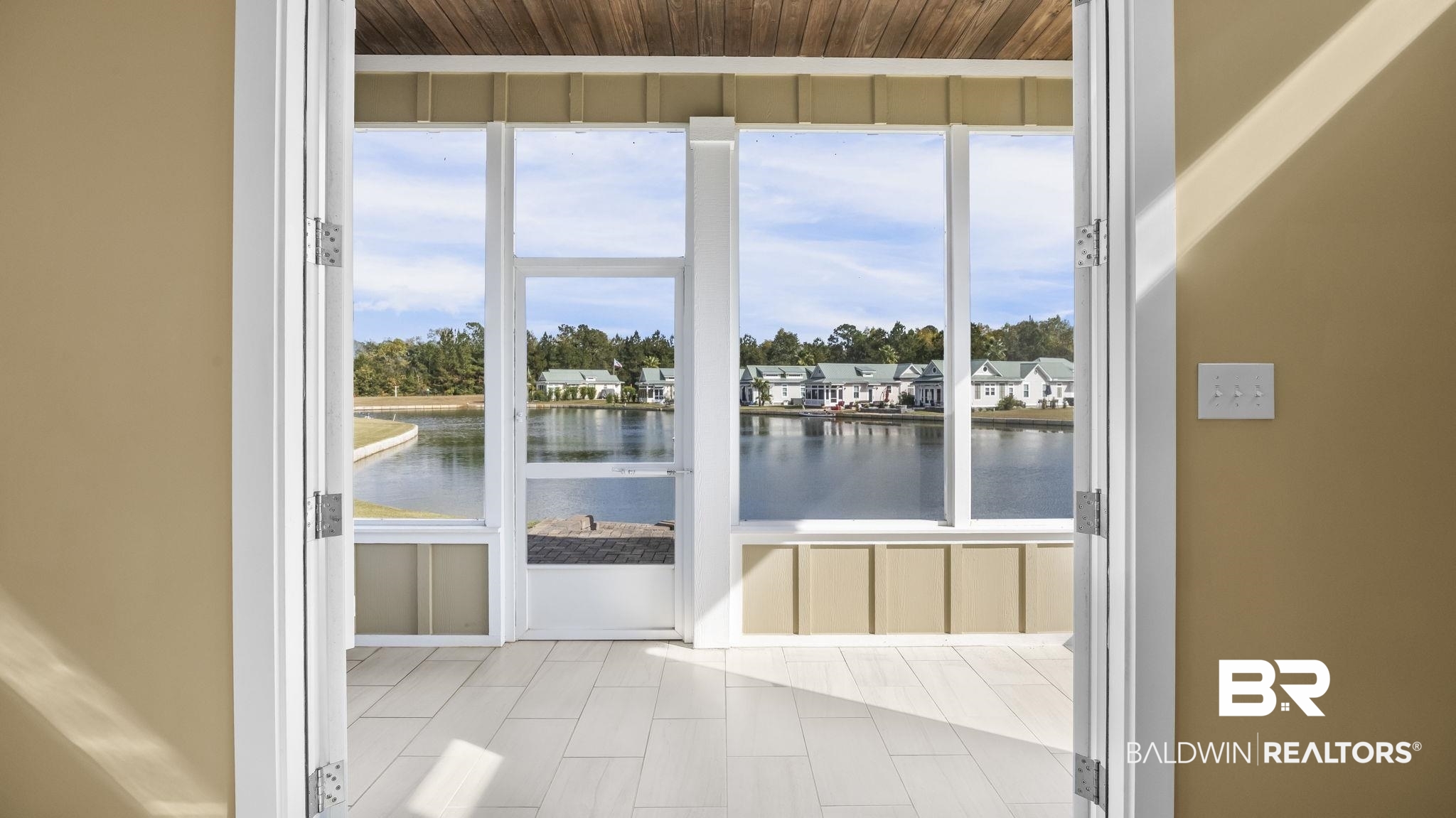 12004 Raptor Court Elberta, AL 36530 - Photo 21 of 57 Doorway featuring healthy amount of natural light, a water view, and a residential view