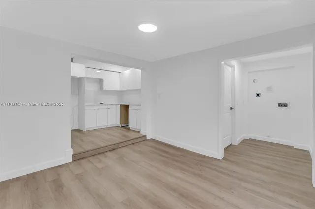 a swimming pool with outdoor seating and yard