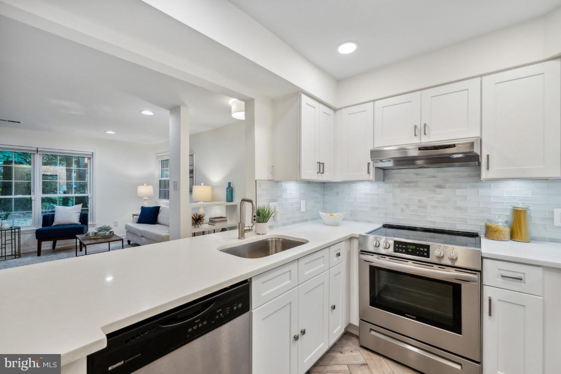 2229 Lovedale Lane, Unit 302B Reston, VA 20191 - Photo 3 of 25 Renovated kitchen with quartz counters
