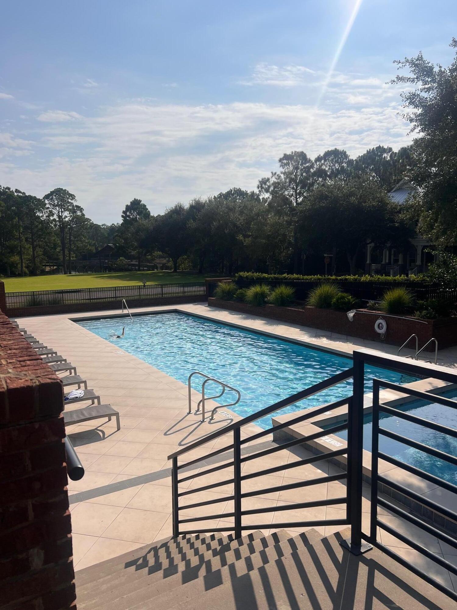 14 Okeechobee West Santa Rosa Beach, FL 32459 - Photo 1 of 3 a view of swimming pool with lake and mountain view