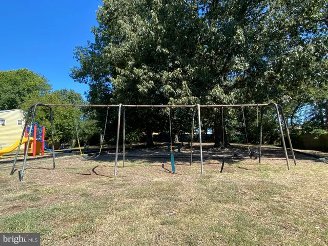 a view of swimming pool with a backyard