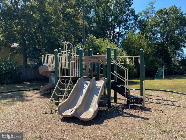 a view of a park with tree s