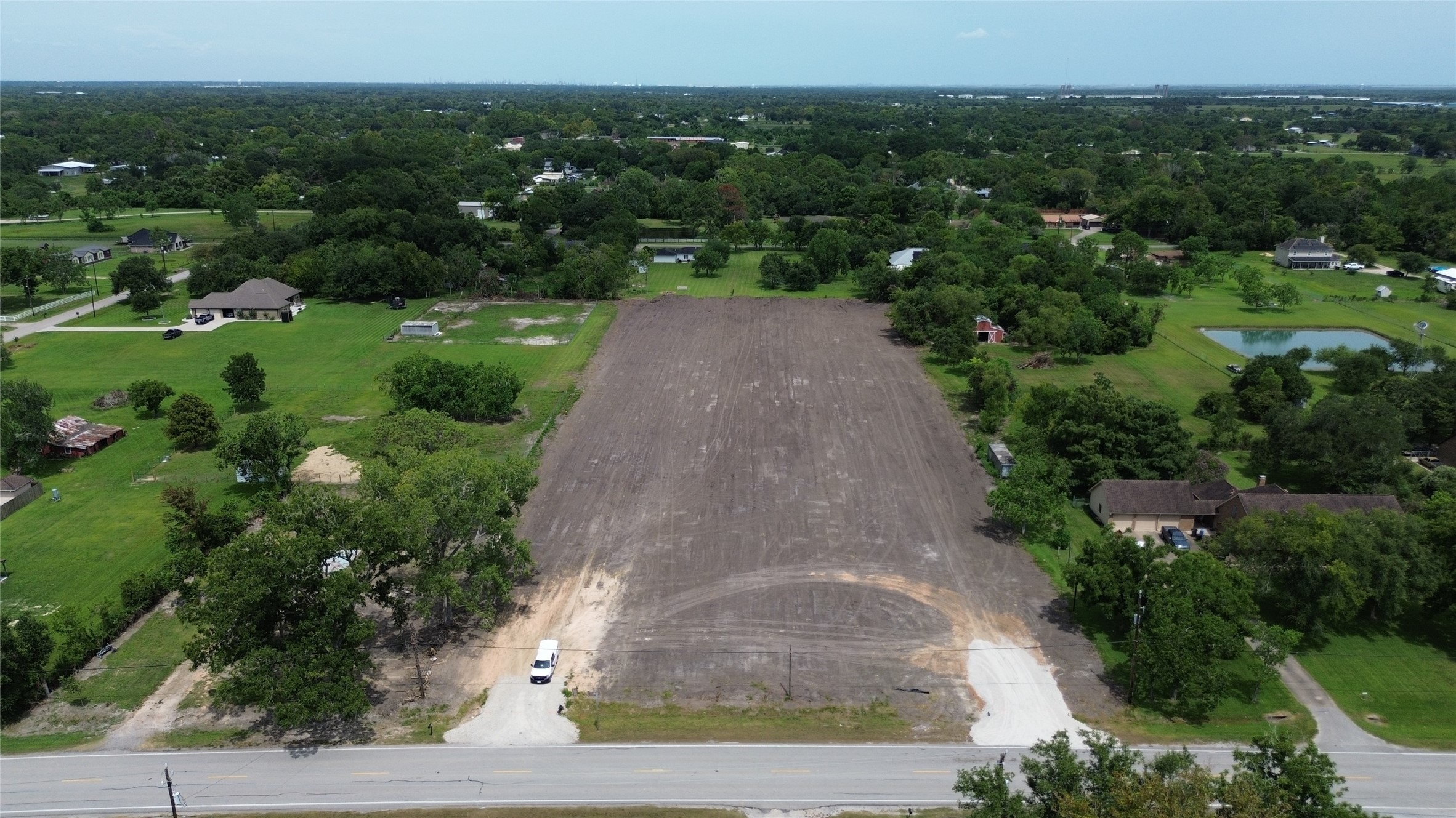 7211 FM 646 Road Santa Fe, TX 77510 - Photo 11 of 12 an aerial view of a house