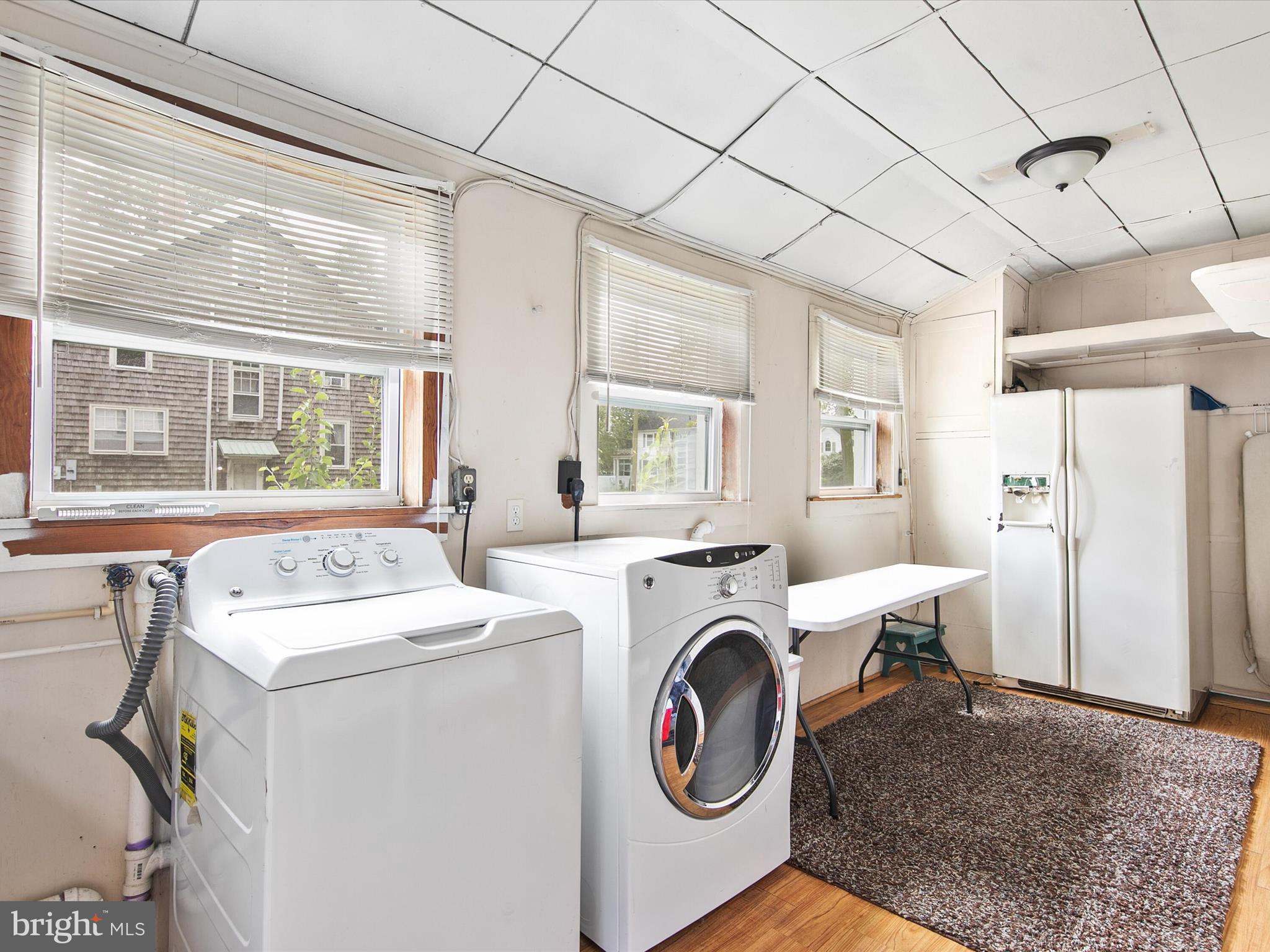 202 North Bedford Street Georgetown, DE 19947 - Photo 13 of 22 a utility room with dryer washer and a window
