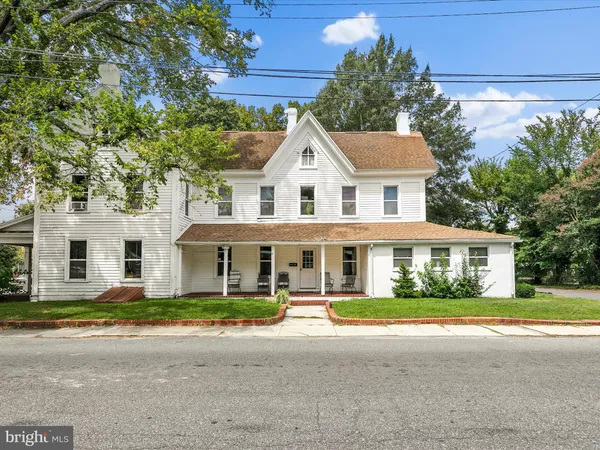 front view of a house with a street