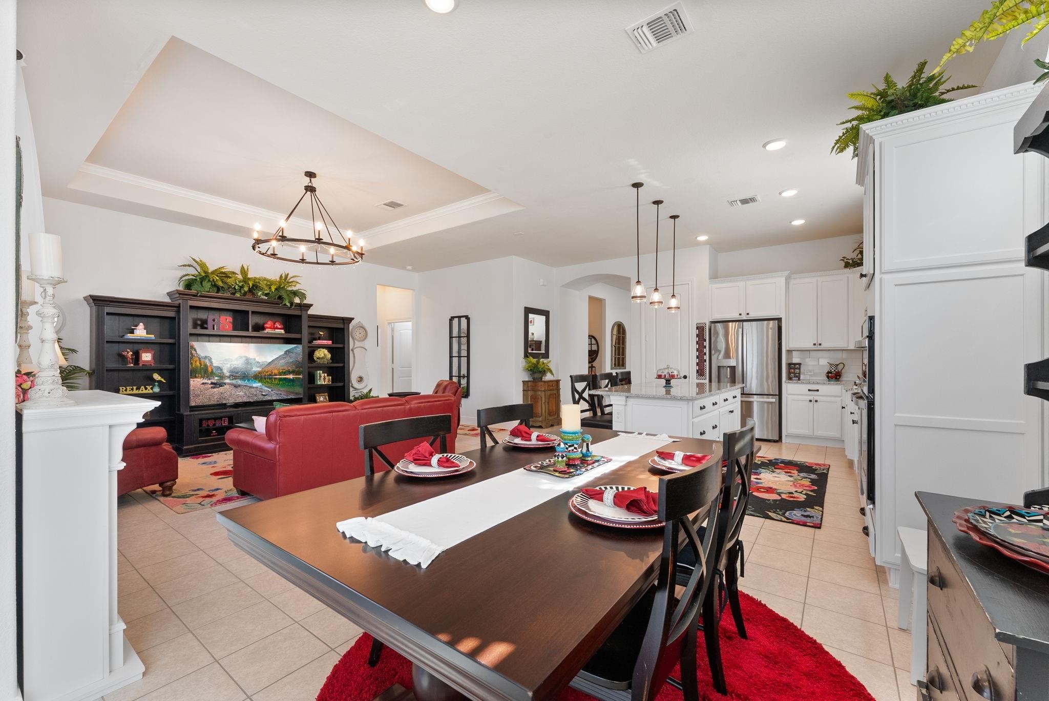 230 Galloway Court Spring, TX 77382 - Photo 13 of 32 a living room with dining room and wooden floor
