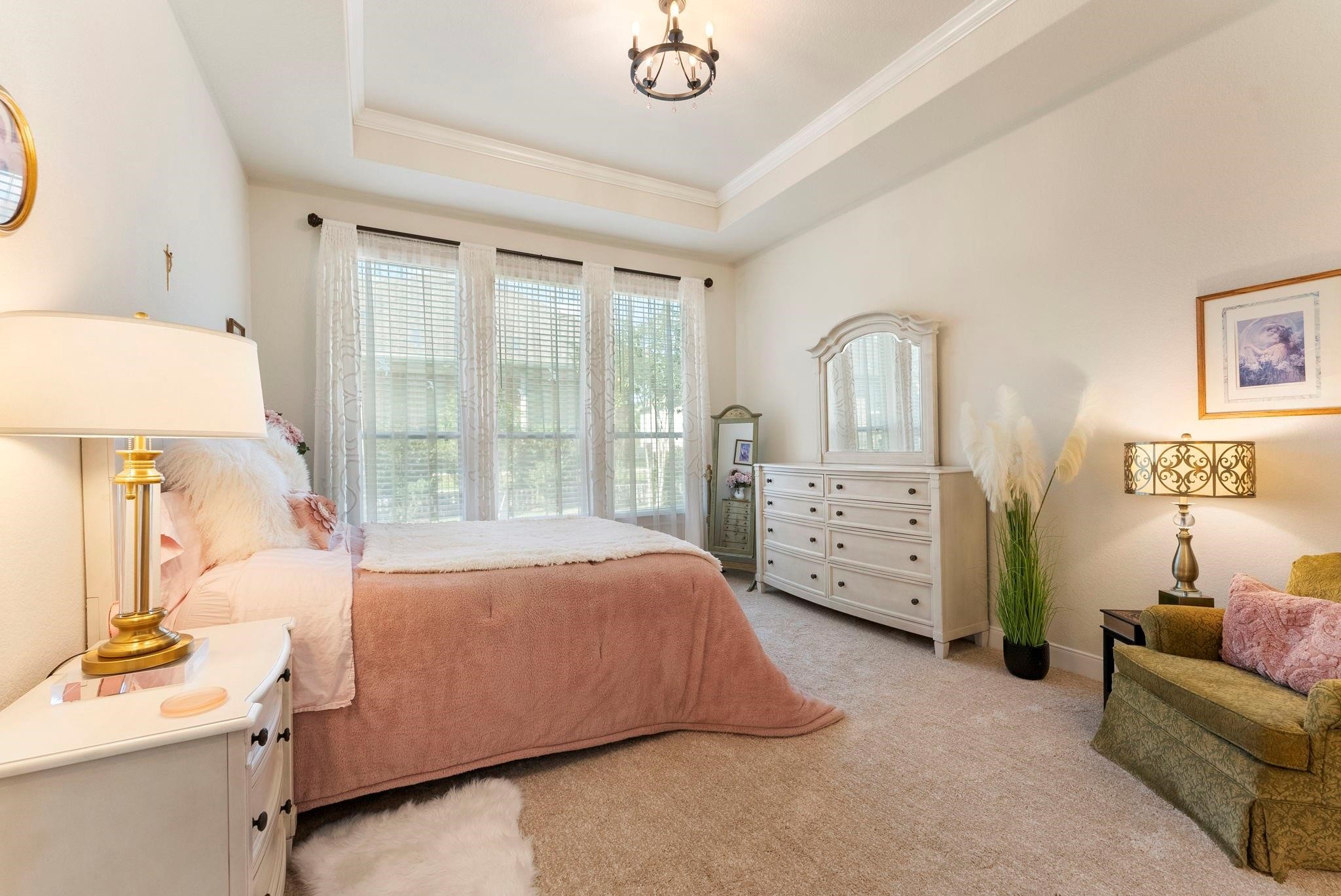 230 Galloway Court Spring, TX 77382 - Photo 18 of 32 a bed room with a bed and a window