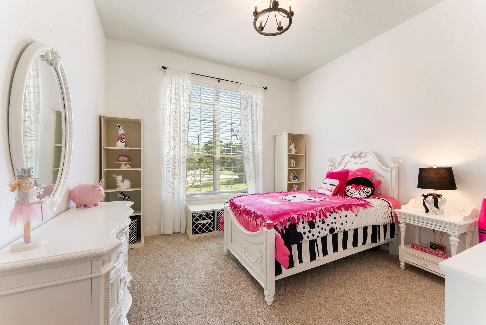230 Galloway Court Spring, TX 77382 - Photo 22 of 32 a bedroom with a bed and a window