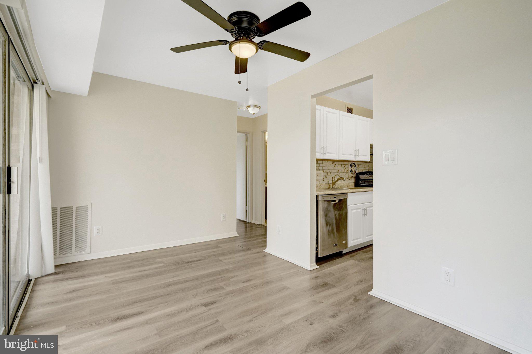 2904 Kings Chapel Road, Unit 5/16 Falls Church, VA 22042 - Photo 13 of 30 a kitchen with stainless steel appliances a refrigerator and a stove top oven