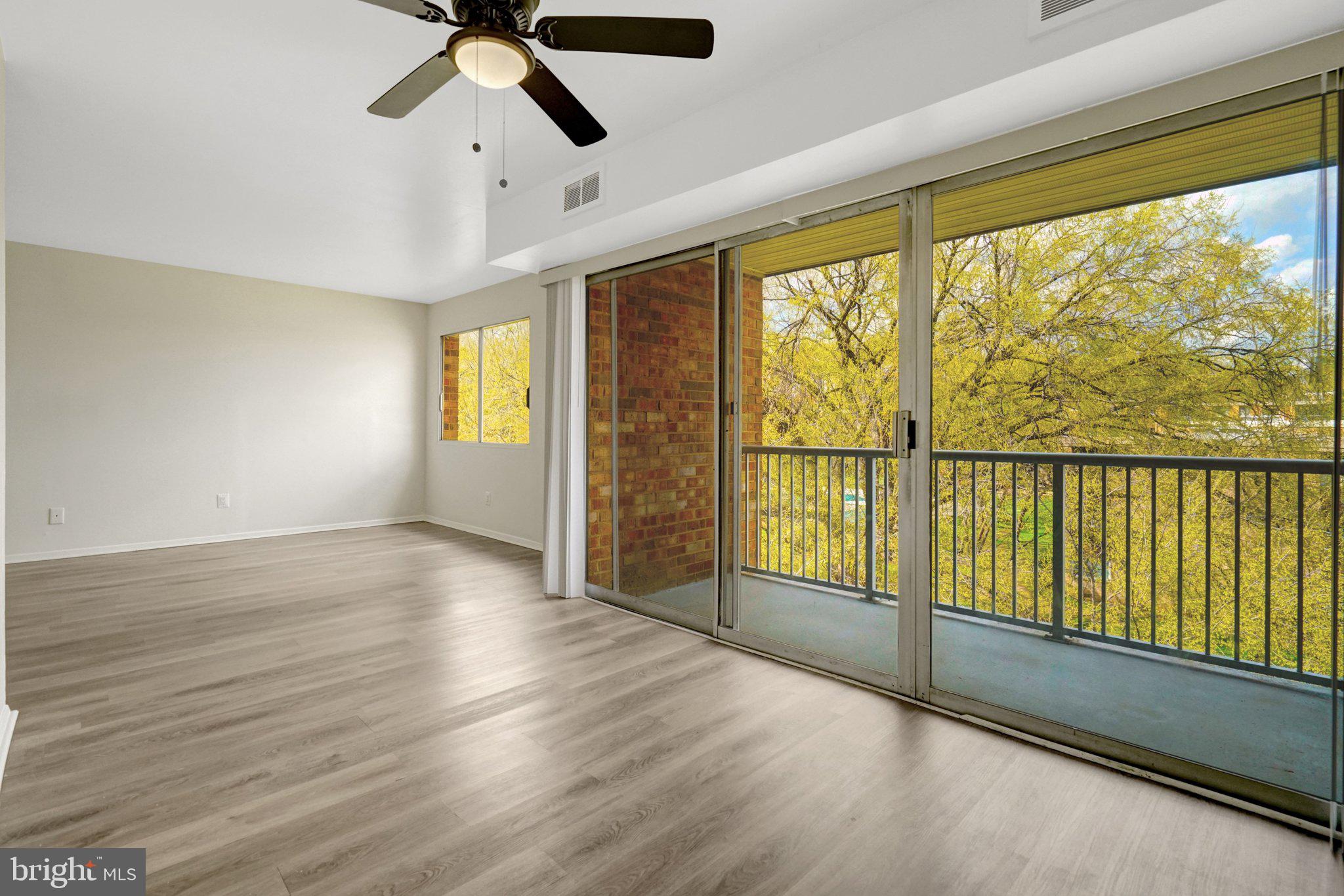 2904 Kings Chapel Road, Unit 5/16 Falls Church, VA 22042 - Photo 14 of 30 a view of empty room with wooden floor and fan