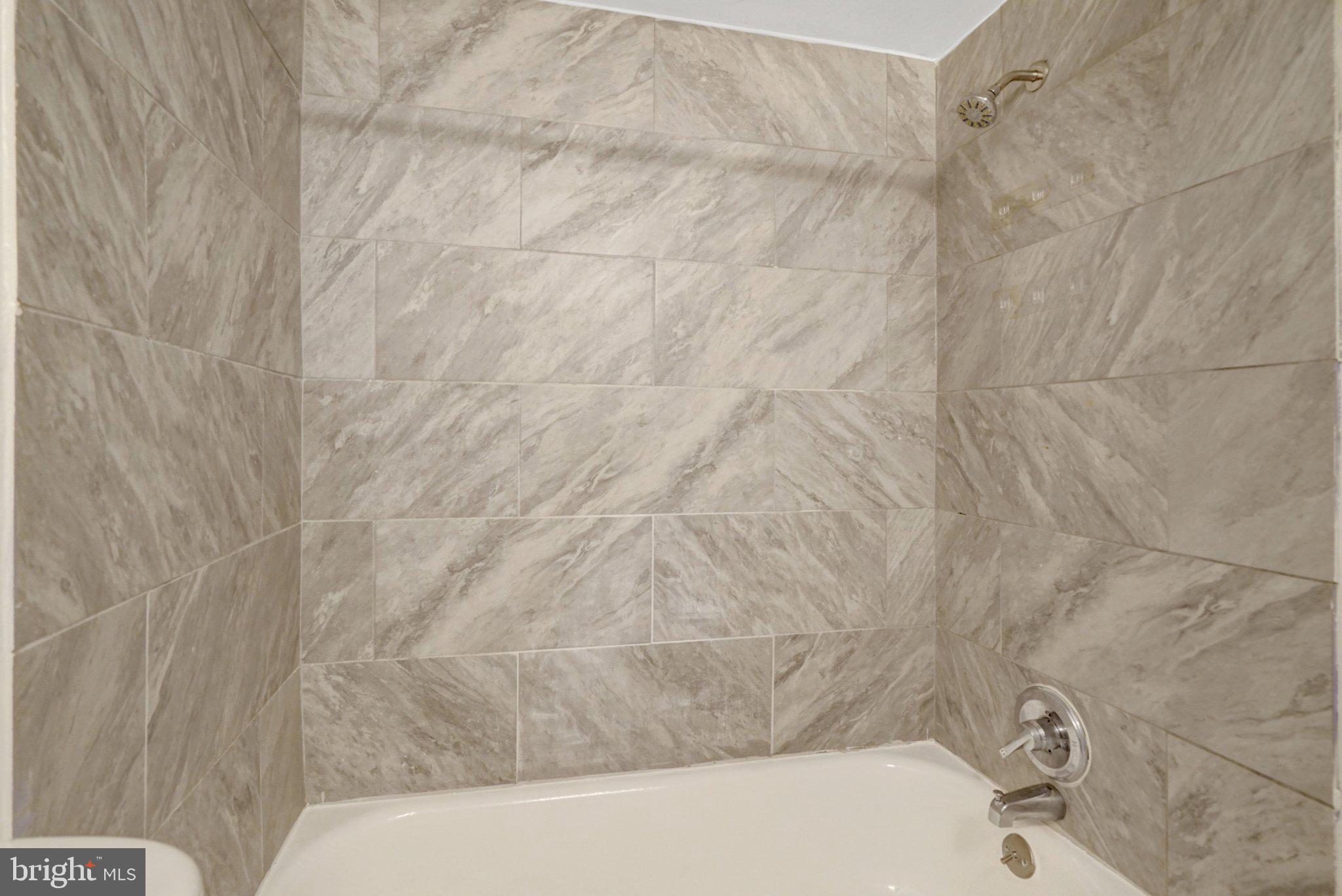 2904 Kings Chapel Road, Unit 5/16 Falls Church, VA 22042 - Photo 16 of 30 a bathroom with a bathtub