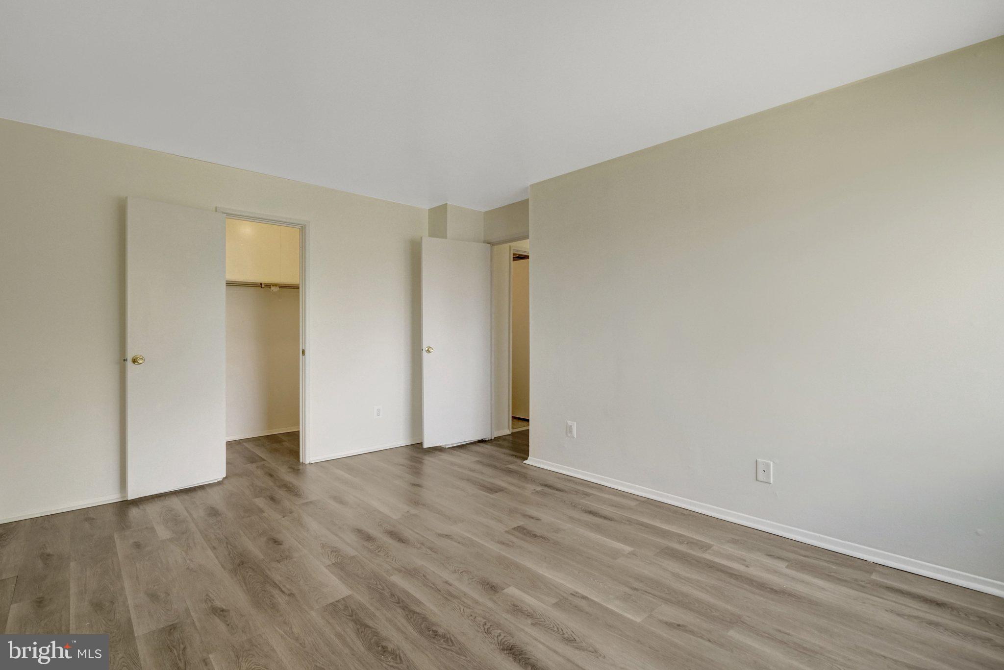 2904 Kings Chapel Road, Unit 5/16 Falls Church, VA 22042 - Photo 22 of 30 a view of an empty room with wooden floor