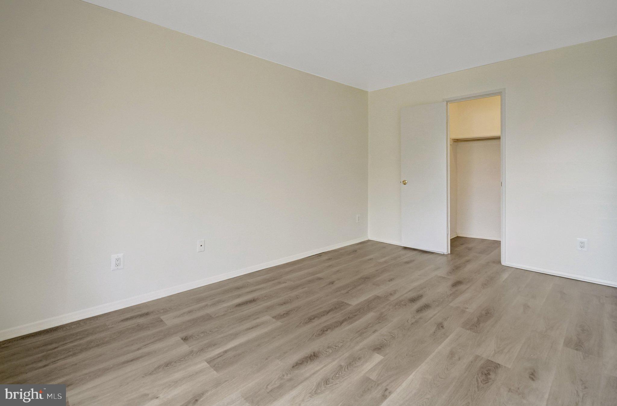 2904 Kings Chapel Road, Unit 5/16 Falls Church, VA 22042 - Photo 23 of 30 a view of empty room with wooden floor and fan