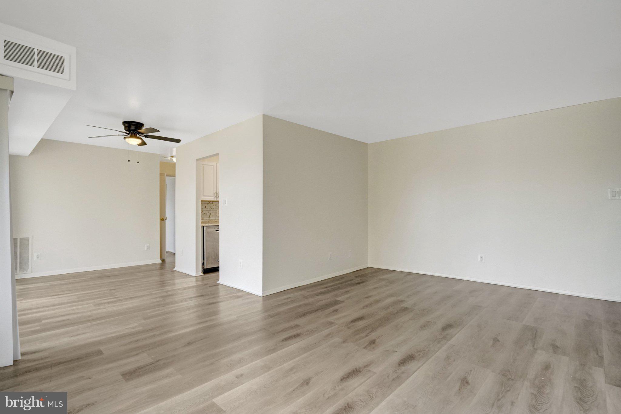 2904 Kings Chapel Road, Unit 5/16 Falls Church, VA 22042 - Photo 9 of 30 a view of an empty room with wooden floor