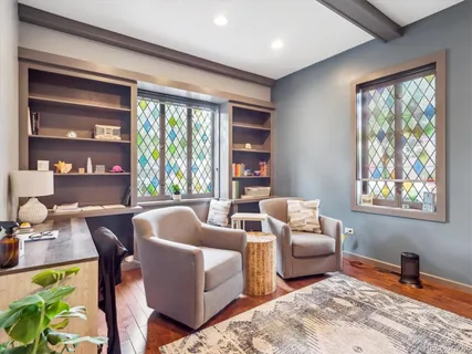 a living room with furniture and a window