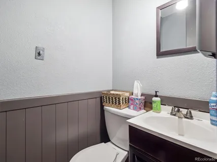 a room with a sink and cabinets