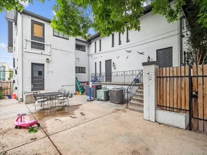 a view of a cars parked in front of a house