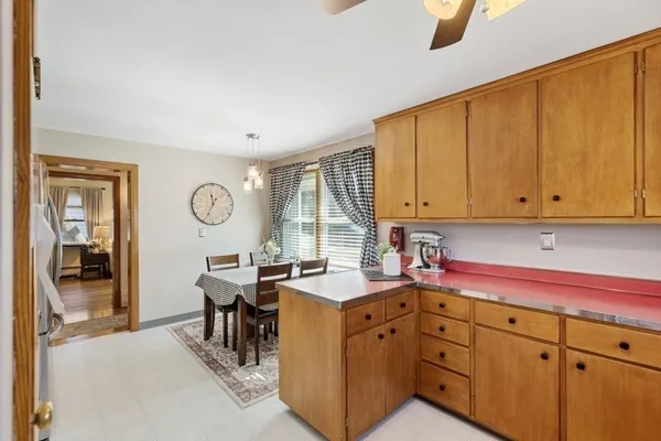 a kitchen with a sink dishwasher stove and refrigerator