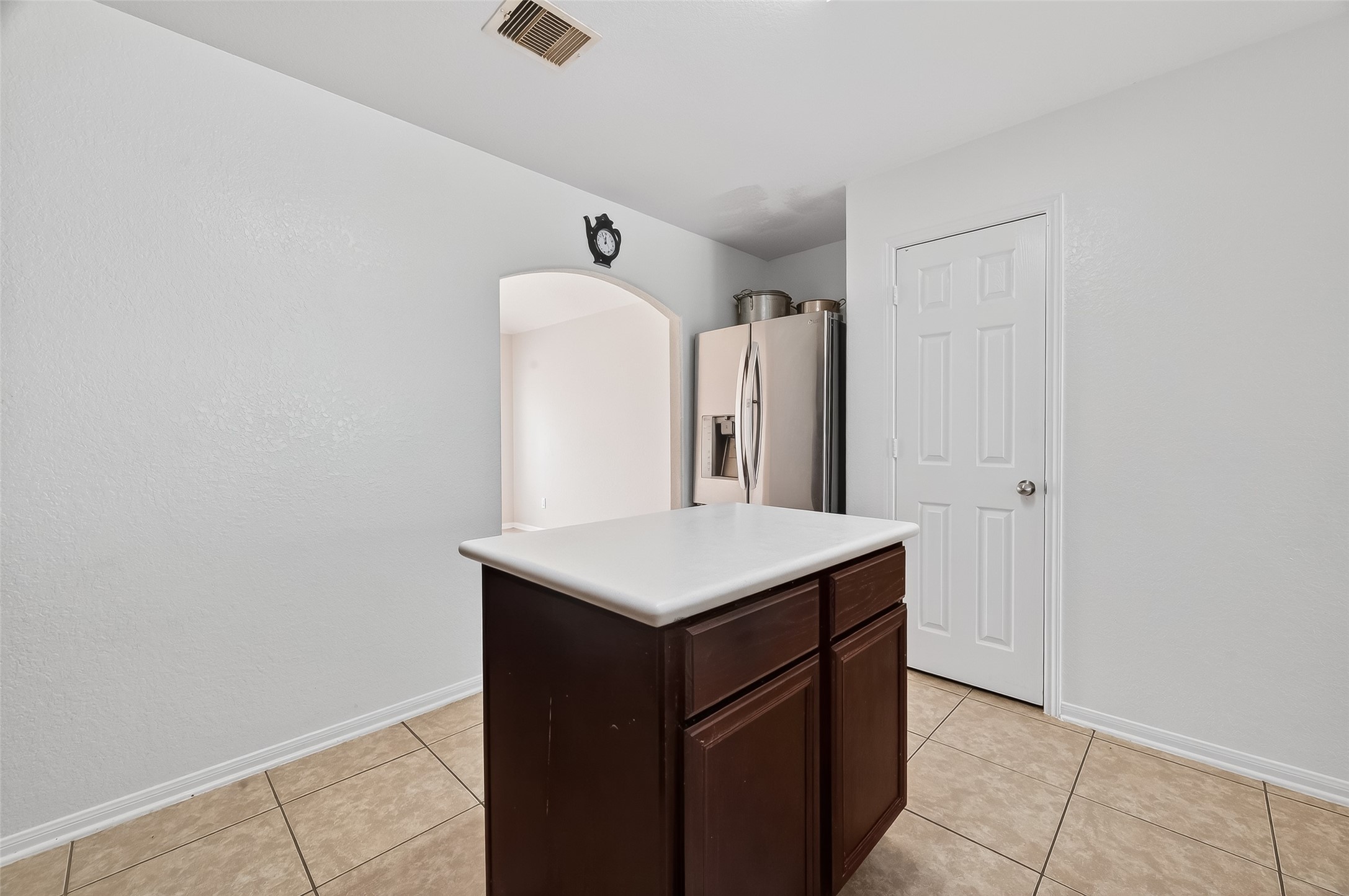 3131 Upland Spring Trace Katy, TX 77493 - Photo 13 of 48 a kitchen with a sink cabinets and wooden floor