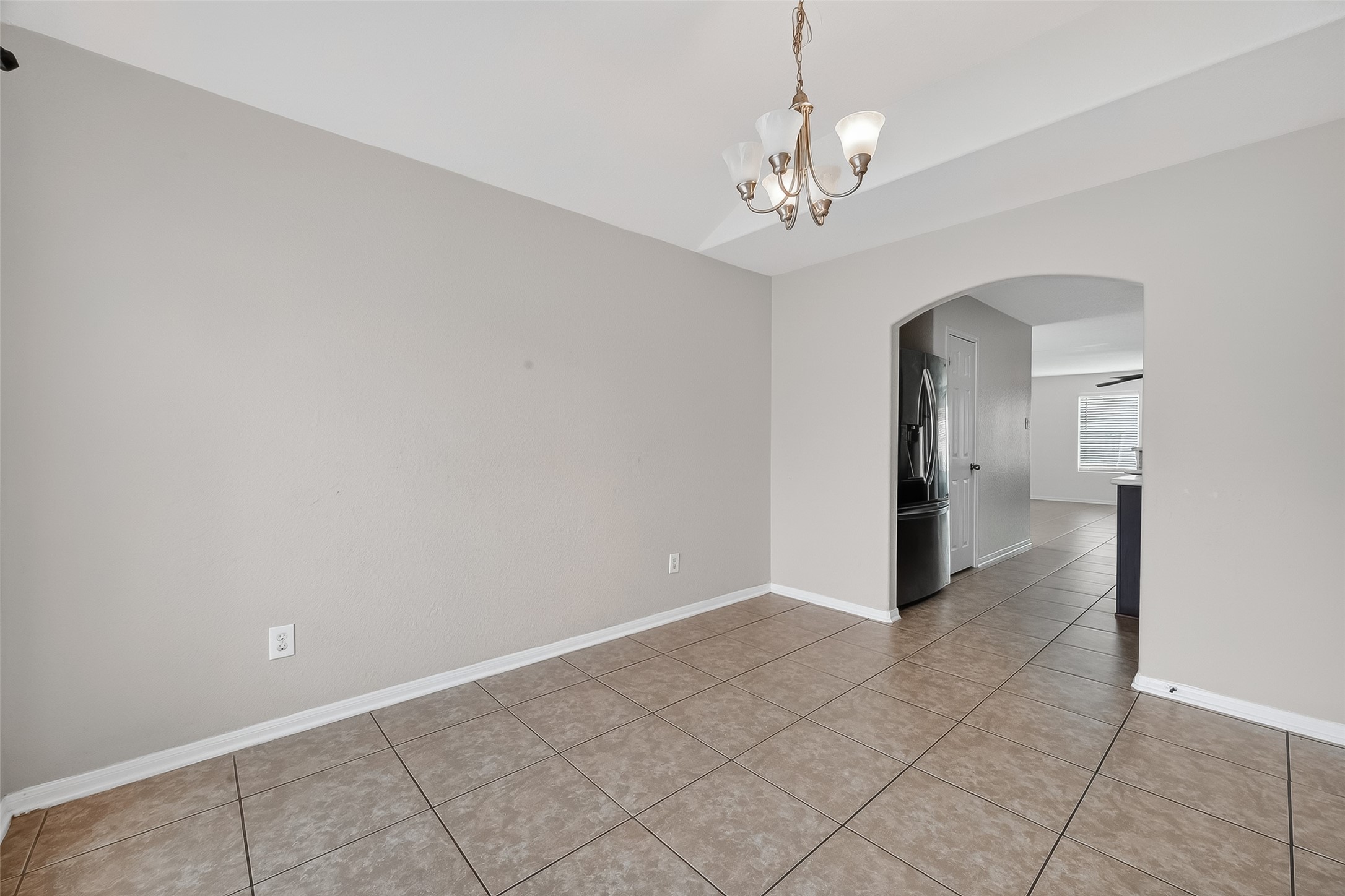 3131 Upland Spring Trace Katy, TX 77493 - Photo 18 of 48 a view of a chandelier in big room and chandelier