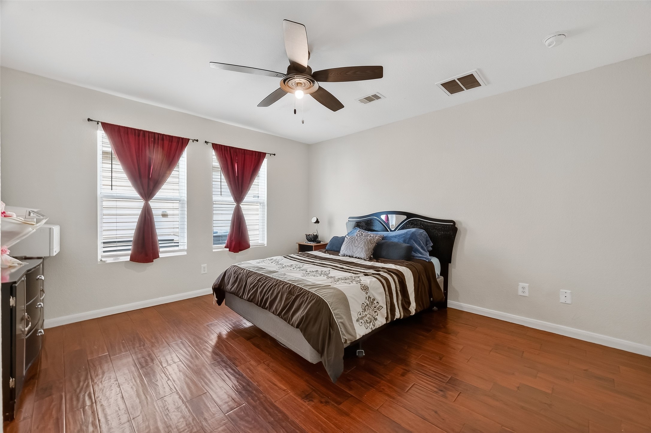 3131 Upland Spring Trace Katy, TX 77493 - Photo 19 of 48 a bedroom with a bed and window