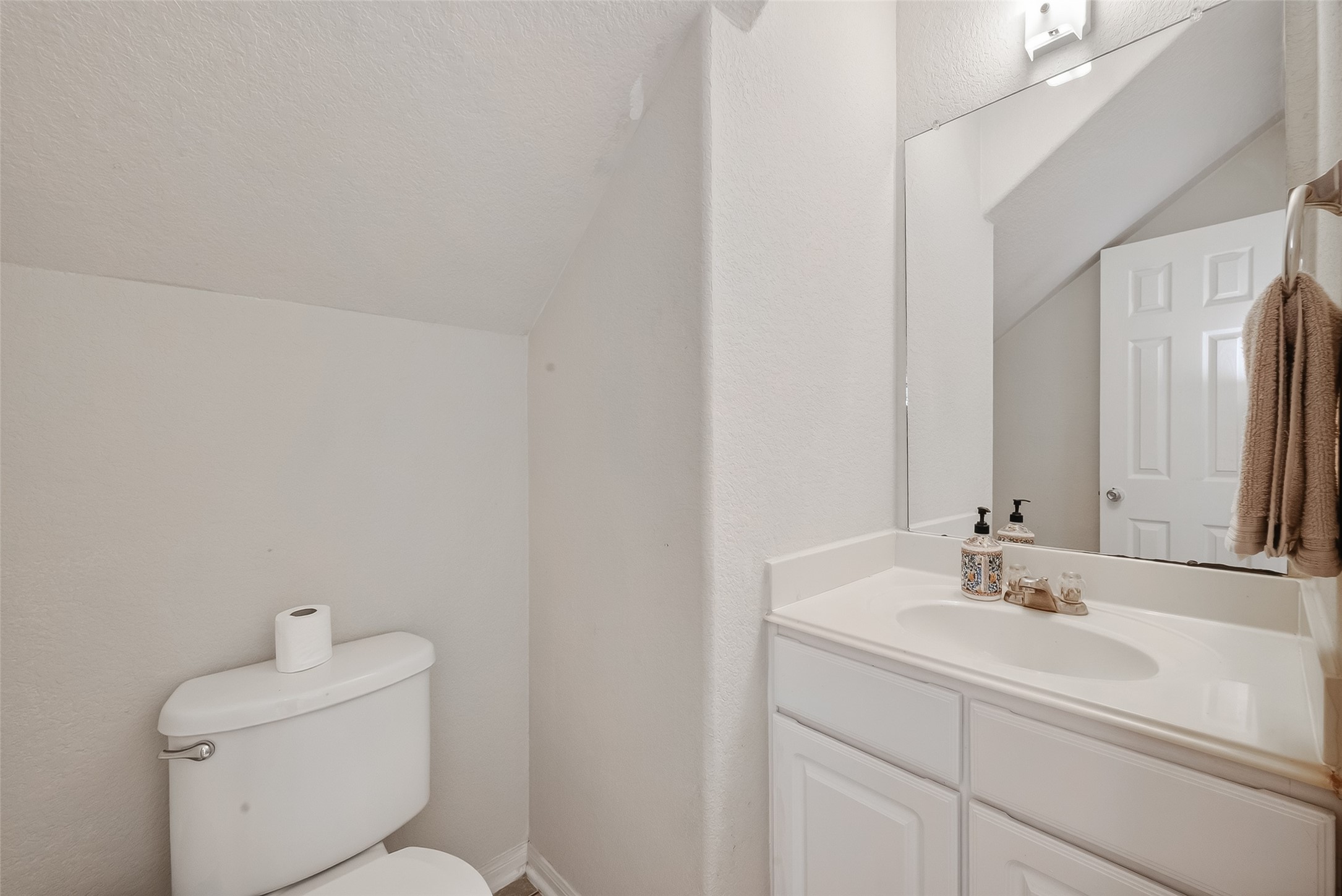 3131 Upland Spring Trace Katy, TX 77493 - Photo 25 of 48 a bathroom with a sink toilet and a mirror