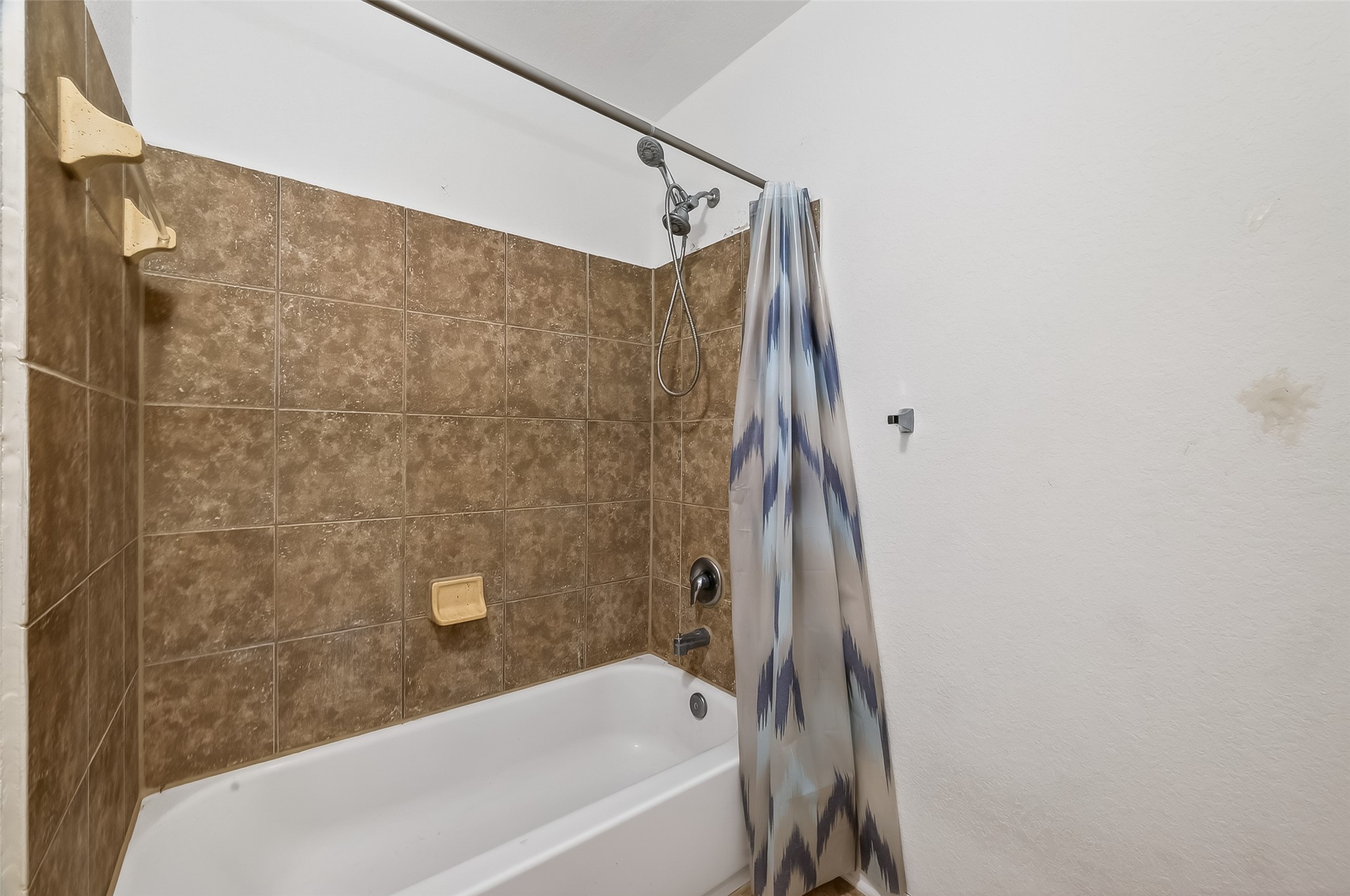 3131 Upland Spring Trace Katy, TX 77493 - Photo 29 of 48 a bathroom with a bathtub and a shower