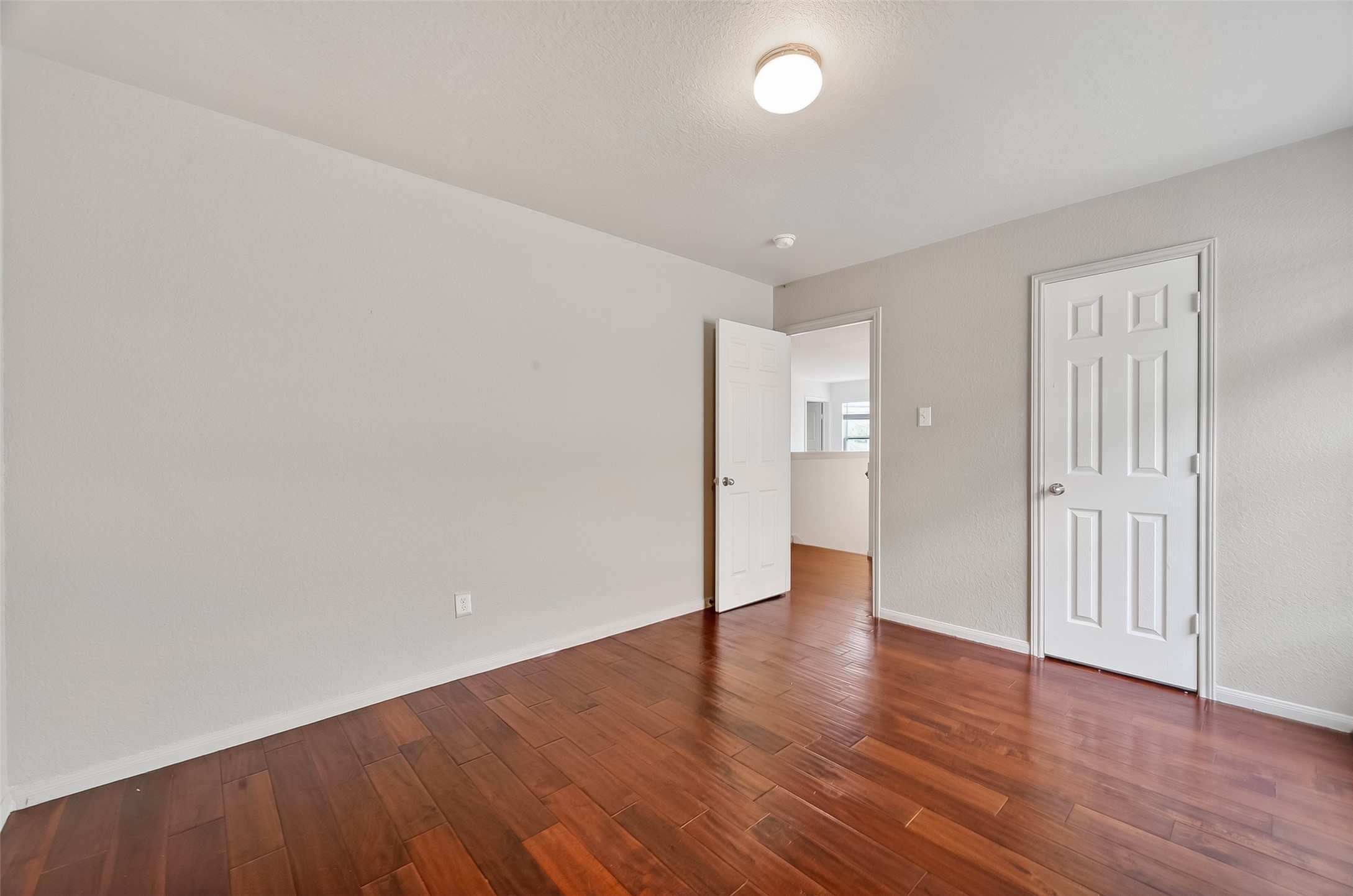 3131 Upland Spring Trace Katy, TX 77493 - Photo 37 of 48 a view of an empty room with wooden floor