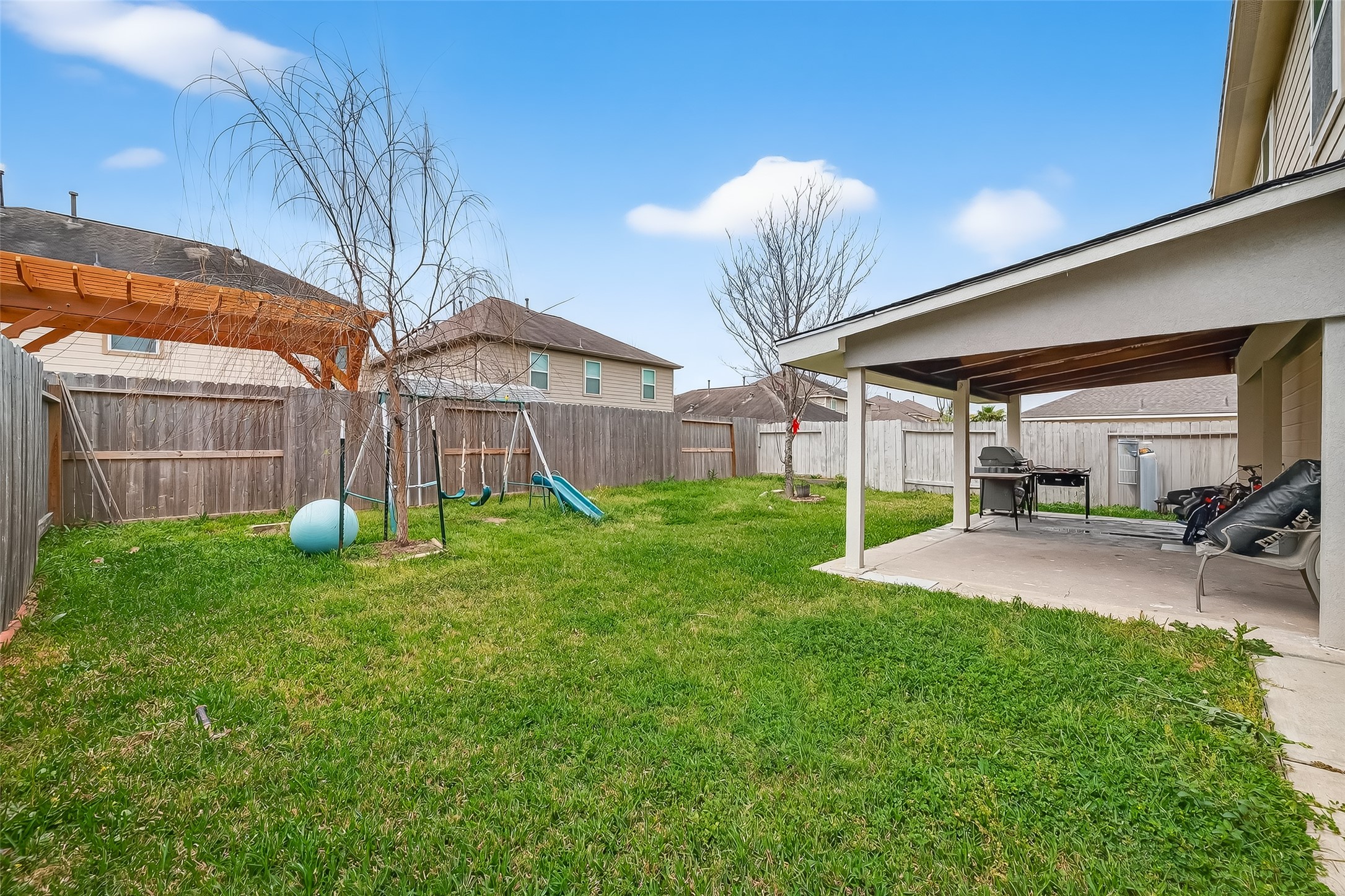 3131 Upland Spring Trace Katy, TX 77493 - Photo 43 of 48 a view of a house with a backyard porch and sitting area