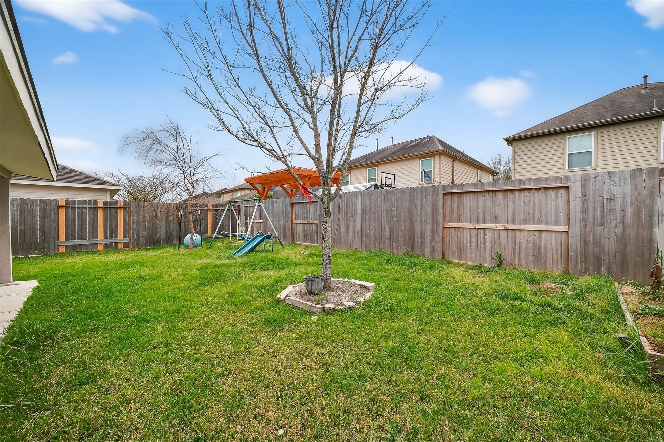 3131 Upland Spring Trace Katy, TX 77493 - Photo 47 of 48 a front view of a house with a garden