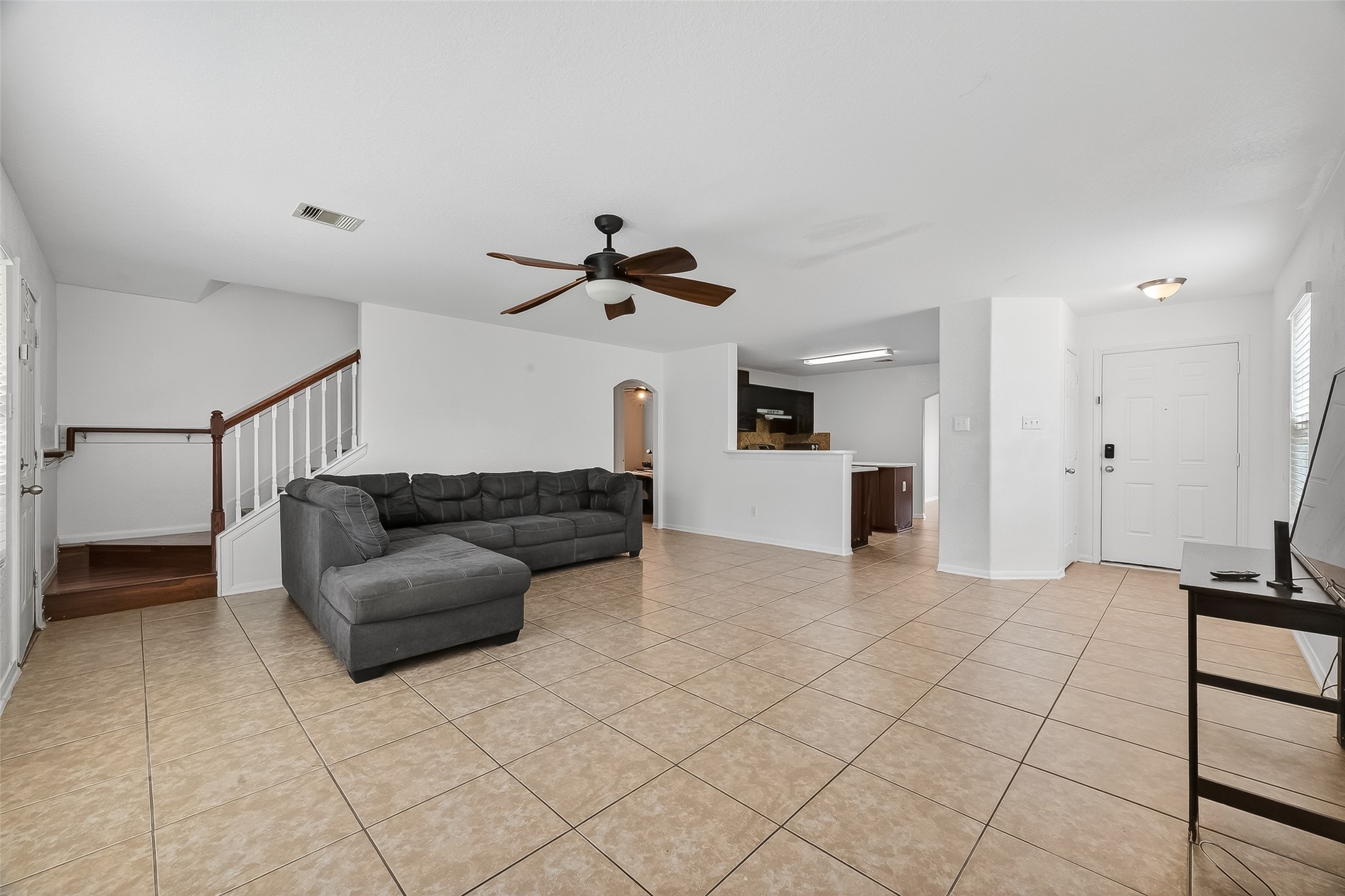 3131 Upland Spring Trace Katy, TX 77493 - Photo 8 of 48 a living room with furniture and ceiling fan