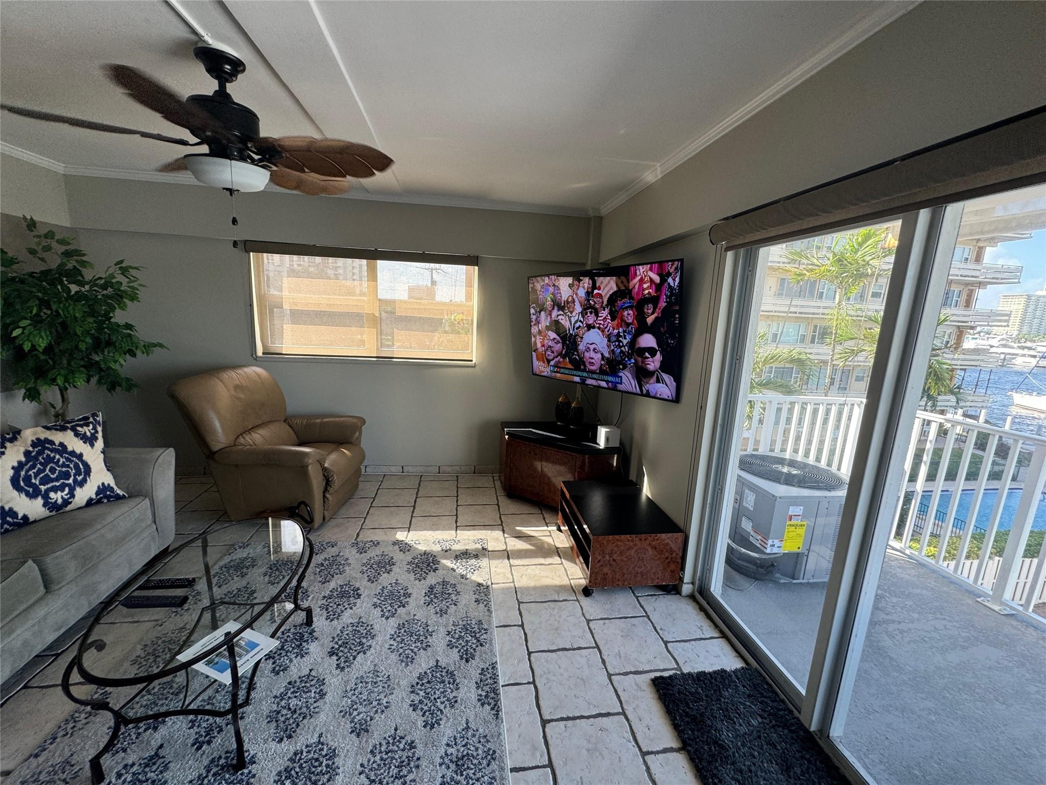 95 North Birch Road, Unit 301 Fort Lauderdale, FL 33304 - Photo 9 of 54 70 inch tv w sleeper sofa