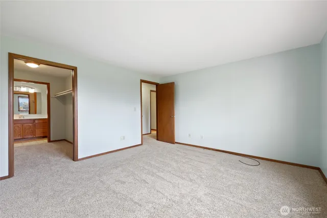 a view of an empty room and a room