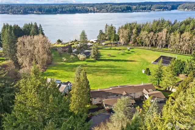 a view of a lake with a big yard
