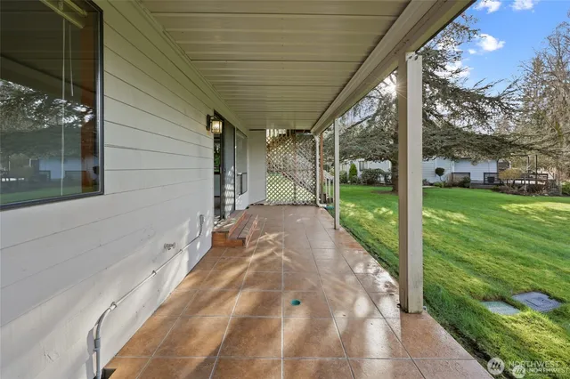 a view of backyard with green space