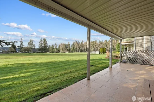 a view of a yard with an outdoor space