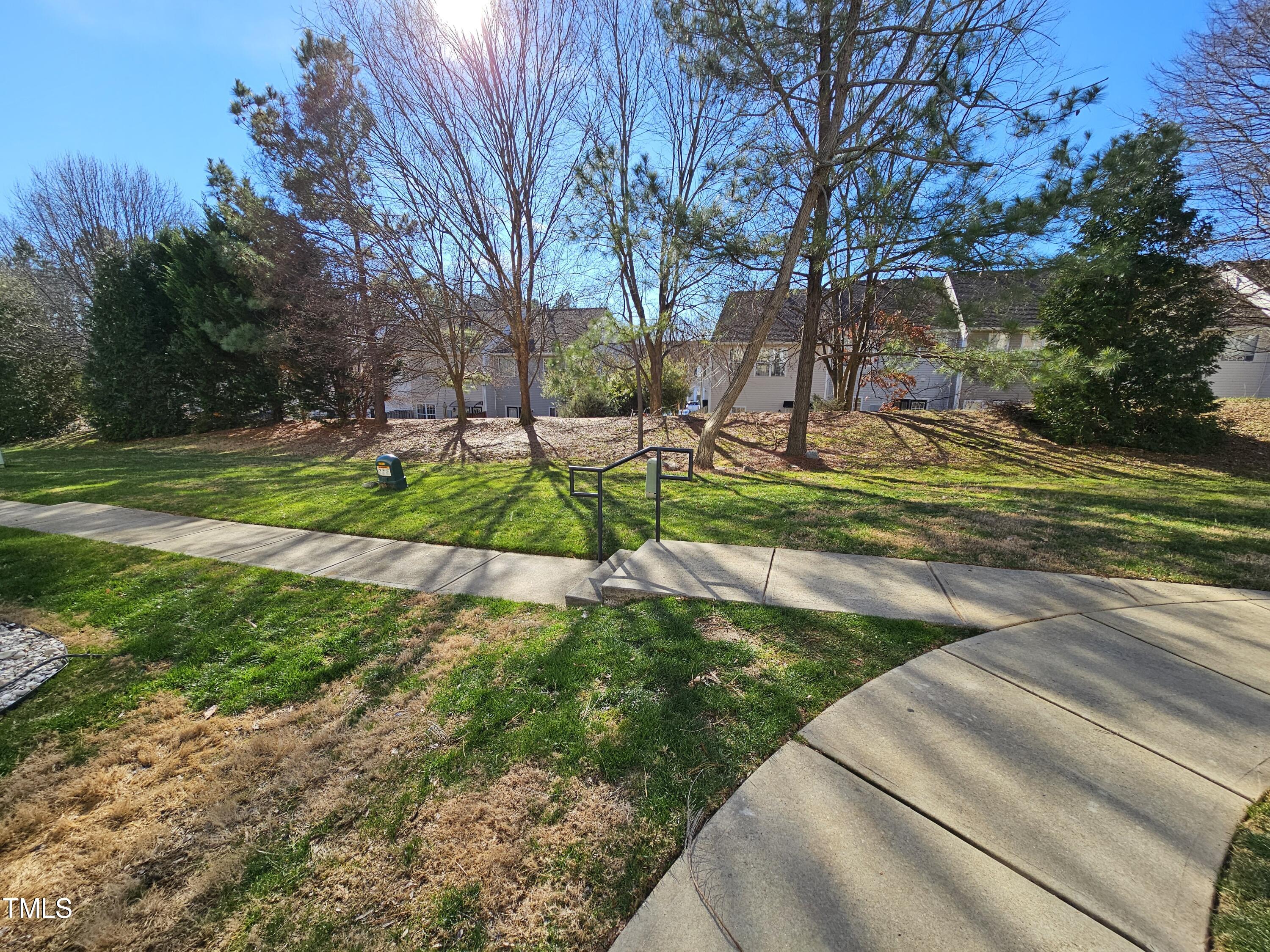 2220 Valley Edge Drive, Unit 107 Raleigh, NC 27614 - Photo 24 of 24 a view of backyard with green space