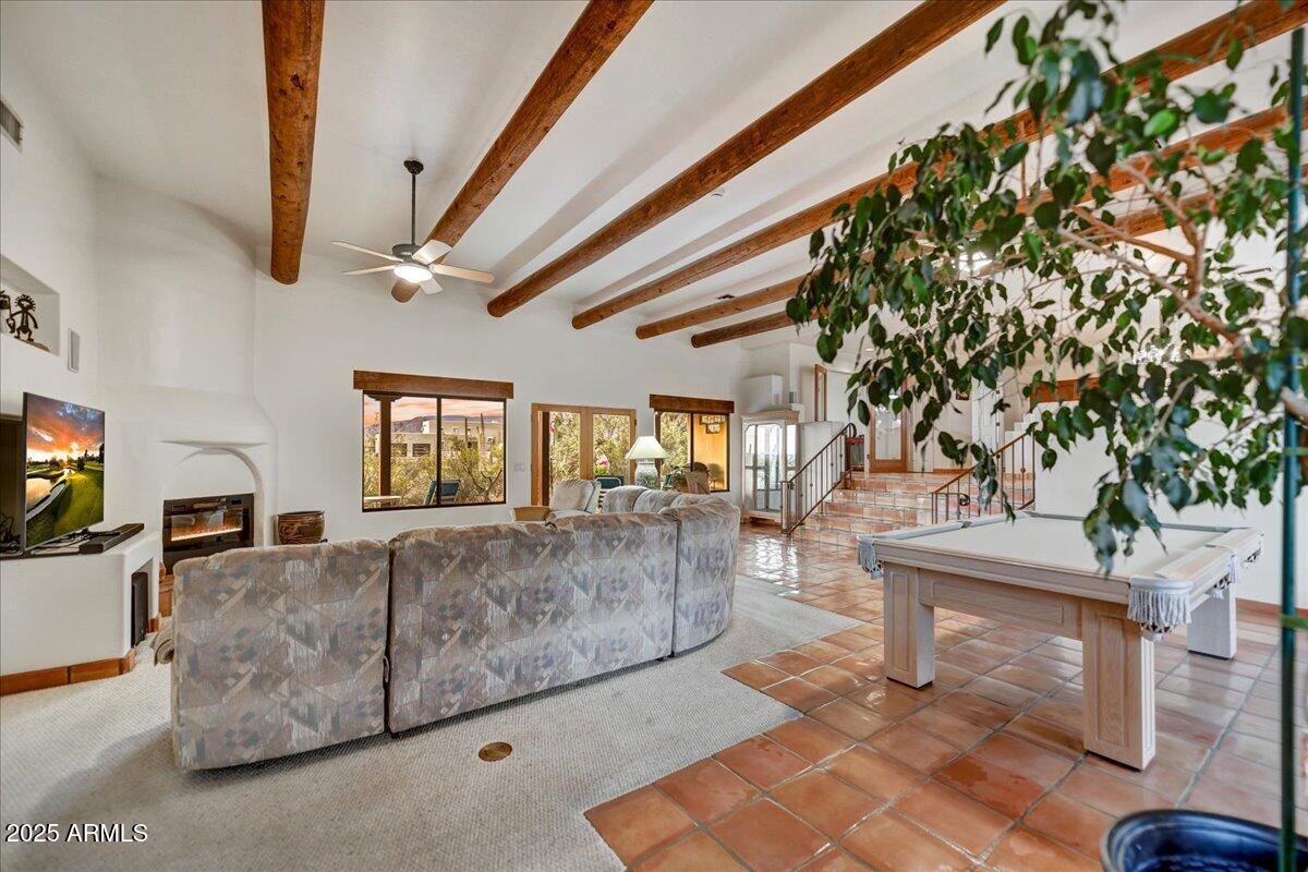 39258 North Ridgeway Drive Cave Creek, AZ 85331 - Photo 11 of 51 a living room with furniture and a flat screen tv