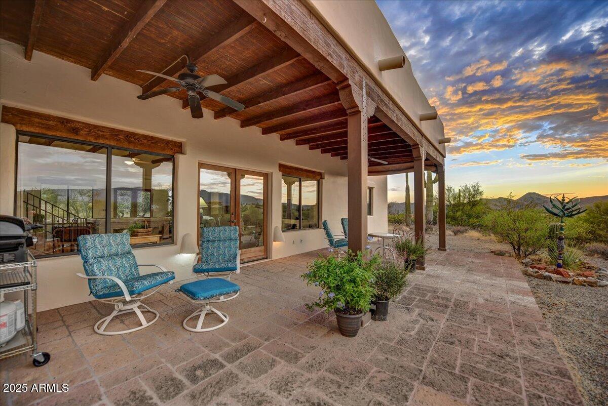 39258 North Ridgeway Drive Cave Creek, AZ 85331 - Photo 33 of 51 a building outdoor space with patio furniture and potted plants
