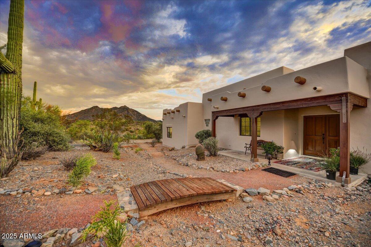 39258 North Ridgeway Drive Cave Creek, AZ 85331 - Photo 36 of 51 a front view of a house with mountain view
