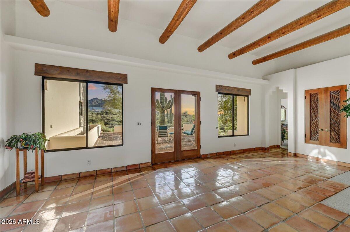 39258 North Ridgeway Drive Cave Creek, AZ 85331 - Photo 46 of 51 a view of an empty room with window and a fireplace
