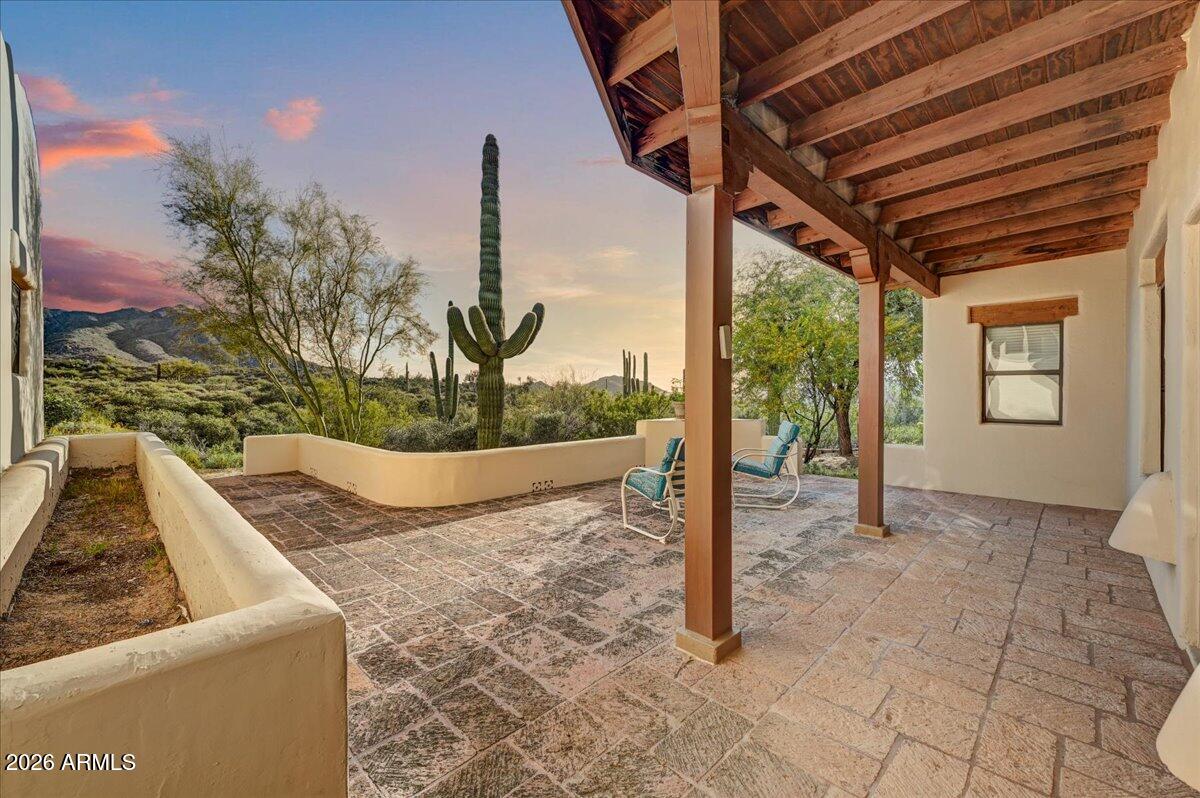 39258 North Ridgeway Drive Cave Creek, AZ 85331 - Photo 5 of 51 a view of a couches in the patio and a fountain