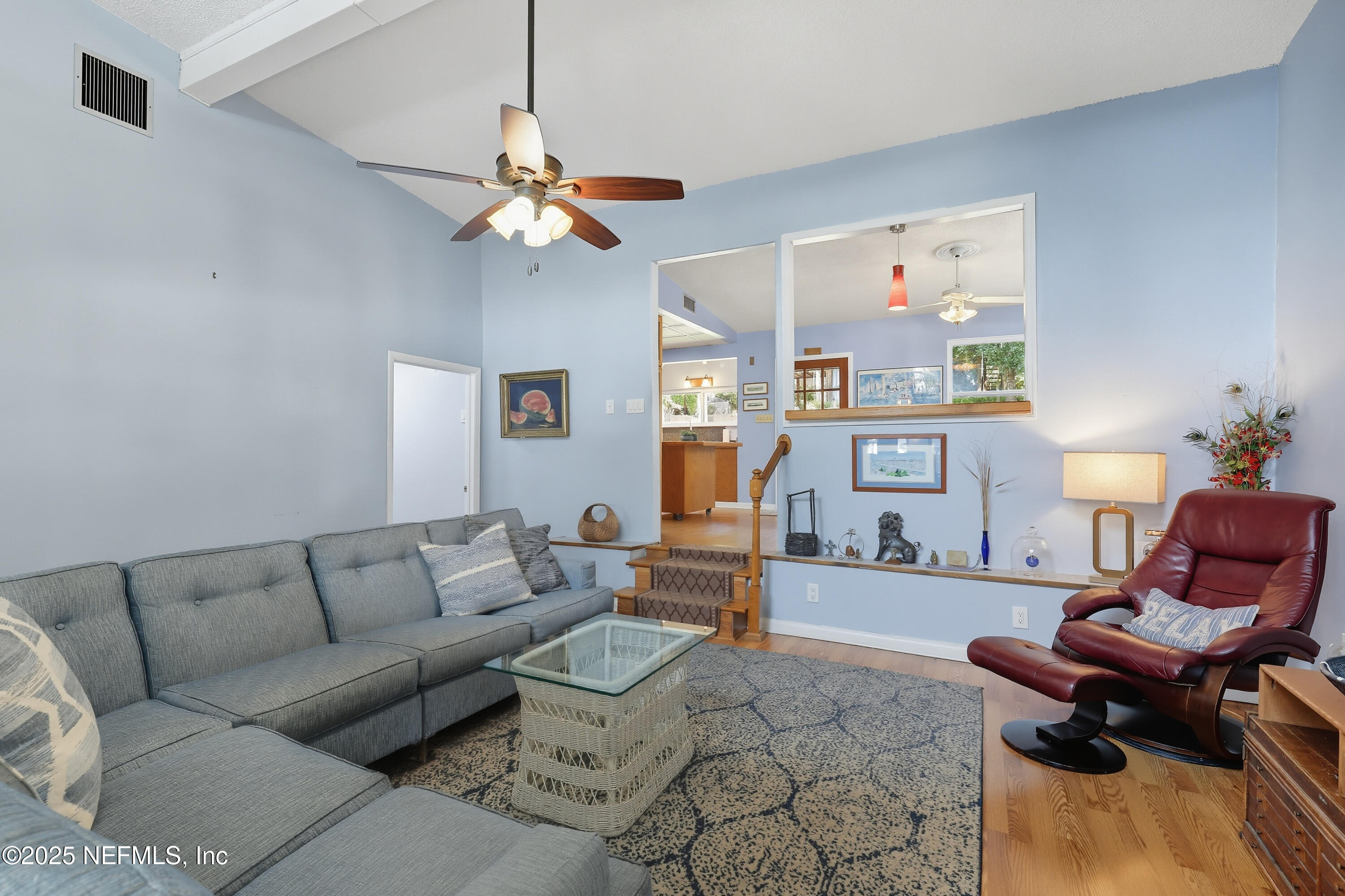 6470 Brooklyn Bay Road Keystone Heights, FL 32656 - Photo 7 of 56 a living room with furniture and wooden floor