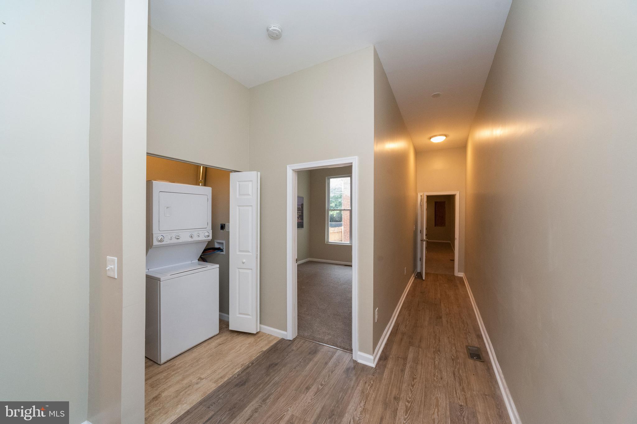 1708 Madison Avenue Baltimore, MD 21217 - Photo 11 of 56 a view of hallway with wooden floor