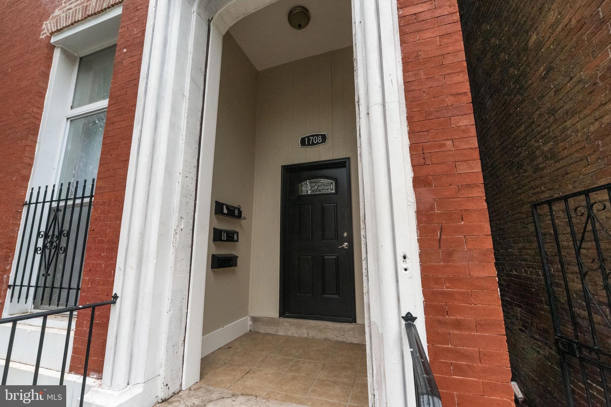 1708 Madison Avenue Baltimore, MD 21217 - Photo 2 of 56 a view of an entryway door