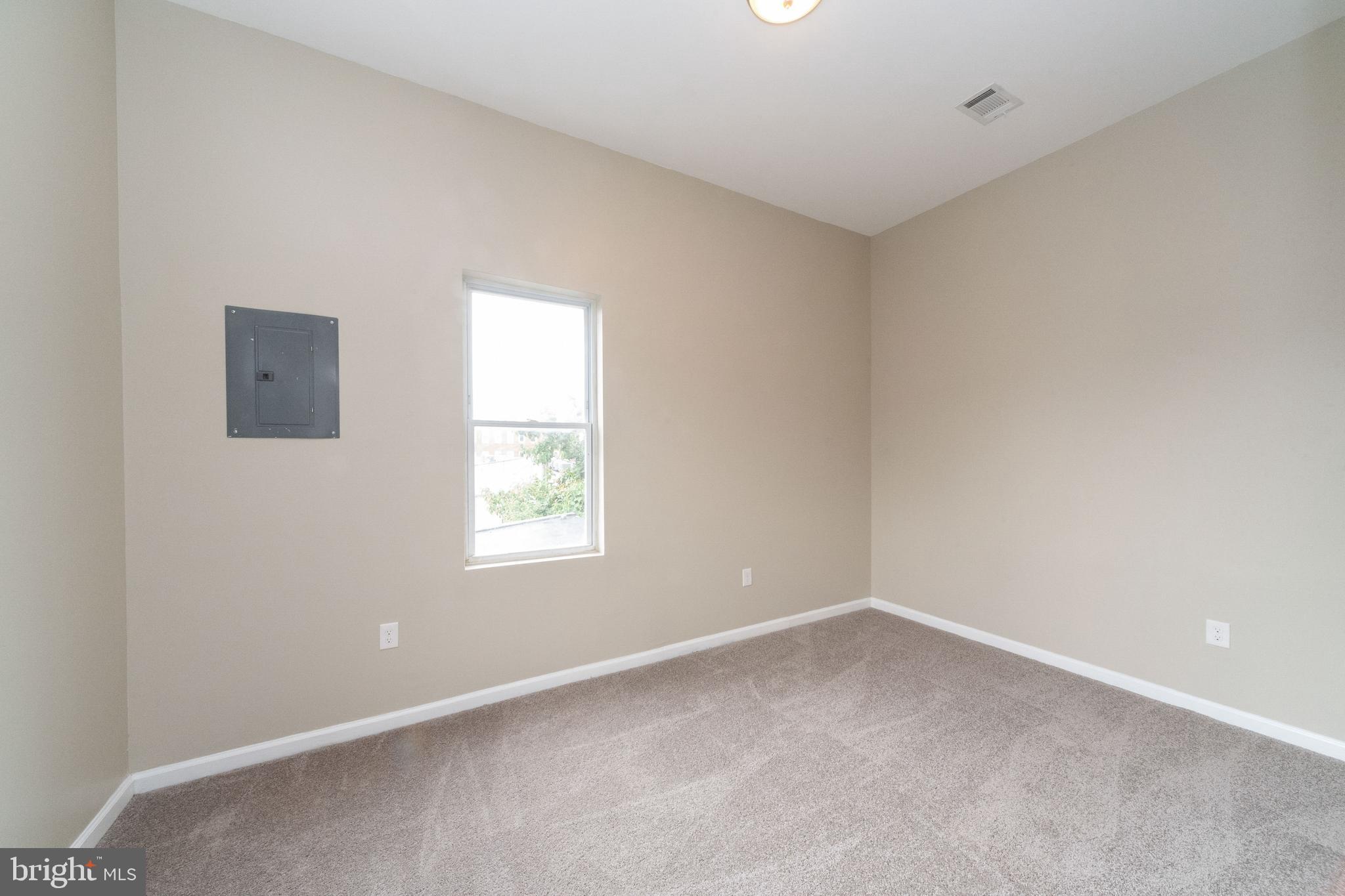 1708 Madison Avenue Baltimore, MD 21217 - Photo 54 of 56 an empty room with a window