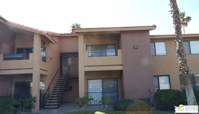 a front view of a house with a garage